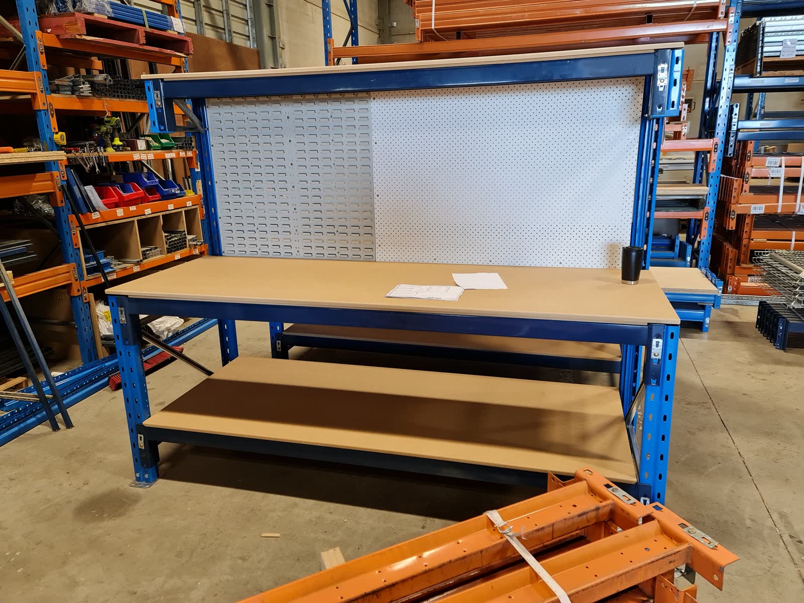 Heavy-duty pallet racking in an industrial or manufacturing setting — high bays, clearly industrial rather than retail context